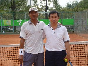 96年度網球會內賽-吳技師與邱技師比賽合影